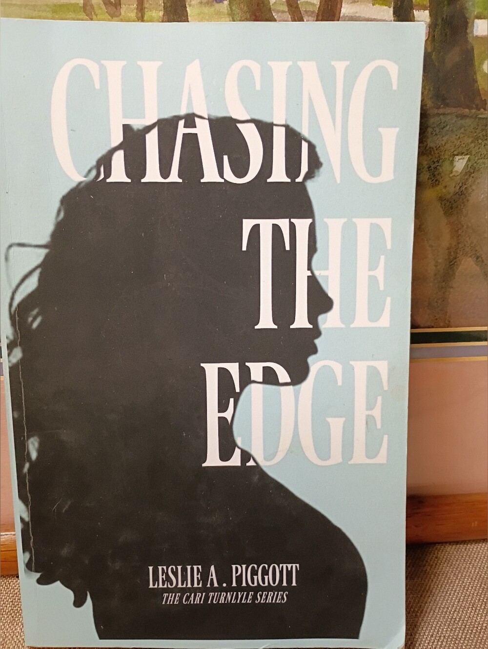 Chasing the Edge by Leslie A. Piggot Book 1 in The Cari Turnlyle Series Pre-own